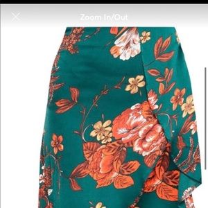 Emerald green asymmetric skirt